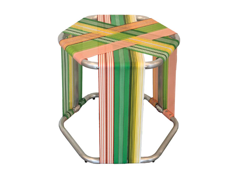 AMLGMTD's Sagamore Webstr Stool blends Florida beach chairs woven fabric into a stool for the perfect mix of Florida beach chic.