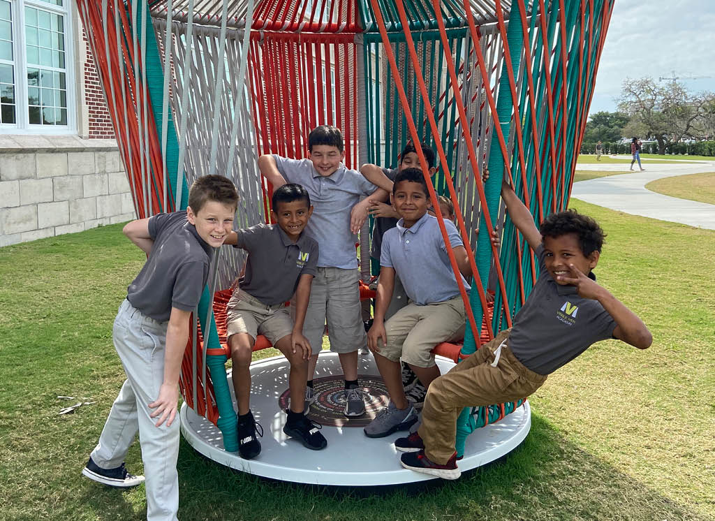 Children playing on Héctor Esrawe and Ignacio Cadena's Los Trompos, Photo: Sarasota Art Museum