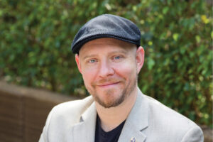 Photo of a man wearing a hat